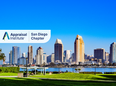 This image shows a scenic view of the San Diego skyline looking across the water from Coronado Island in California with the Appraisal Institute San Diego Chapter Logo