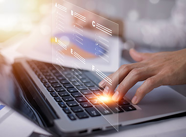 businessman-using-a-laptop-and-taking-an-assessment-questionnaire-evaluation-online-survey-online-exam-choosing-the-right-answer-in-exam-by-filling-out-the-online-survey-form-answer-test-questions