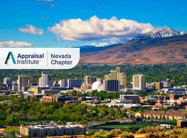 This image shows an aerial view of Reno, Nevada, which is affectionately nicknamed "The Biggest Little City in the World with the Appraisal Institute Nevada Chapter Logo