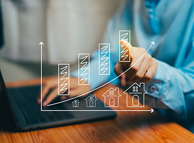 growth-in-real-estate-investment-with-bar-graph-and-icons-of-houses-on-a-digital-screen-business-concept
