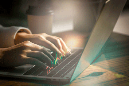 Close up of someone at work in office with laptop. Concept of analysis,growth, Market research reports and income statistics, Financial and Accounting ,double exposure with network effects.